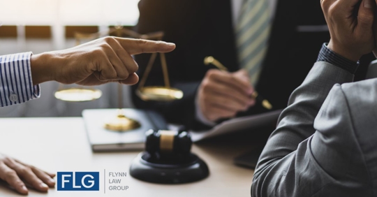 pointing fingers in a law office over estate planning dispute